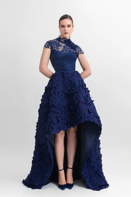 High-neckline long dress; lace upper part with flower details on the side, and wide asymmetrical hemline laser-cut skirt